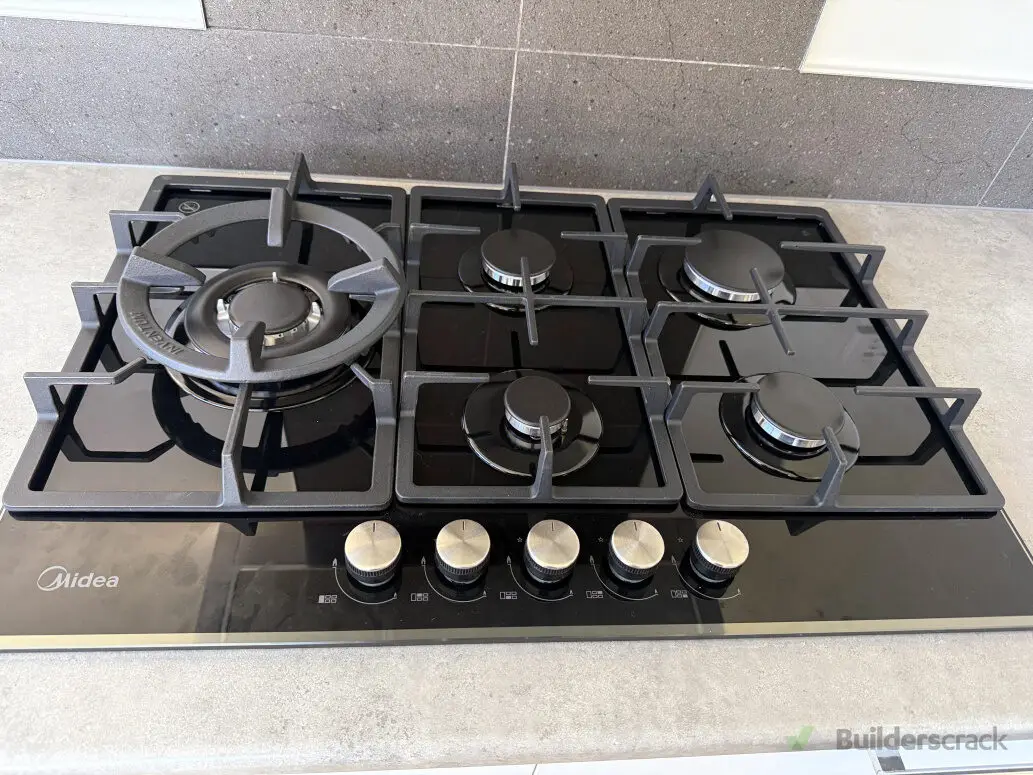 Five-burner gas hob installed in a Hamilton kitchen